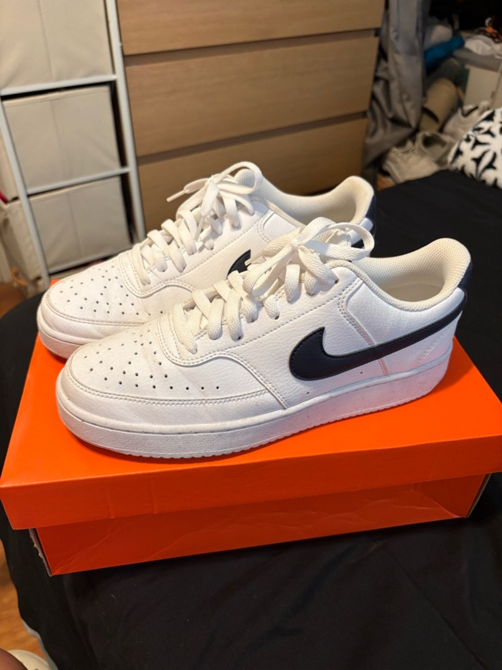 Nike White Sneakers with Navy Swoosh Accent